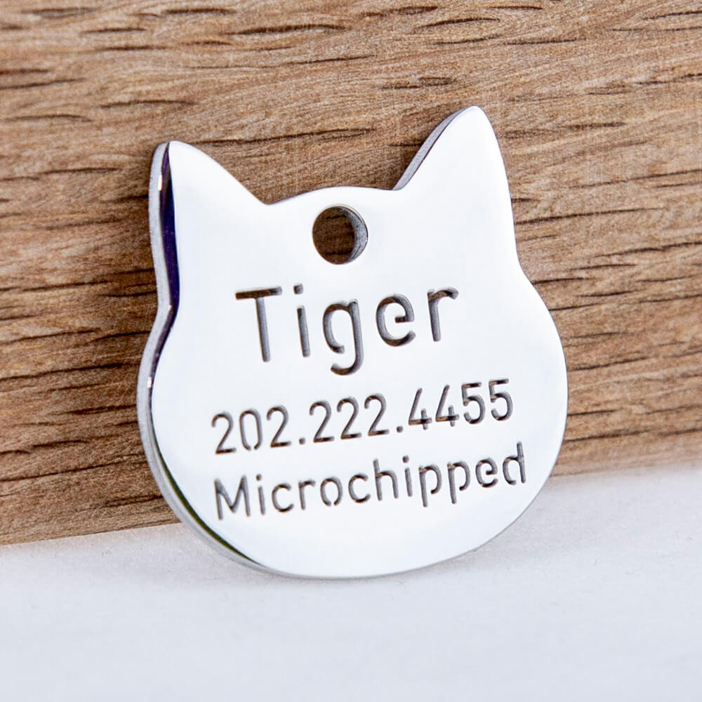 custom hollow laser-cut stainless steel hollow tags for cat with cut-through name lettering