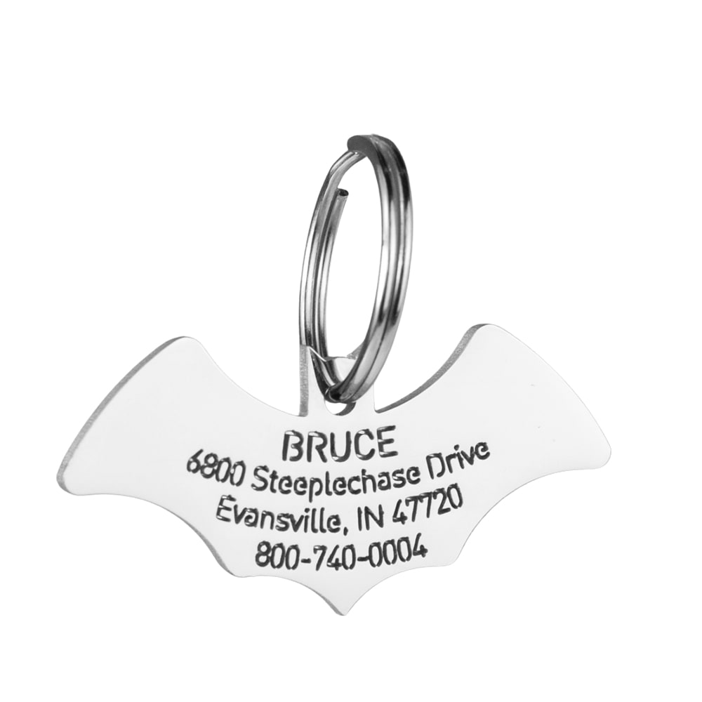 custom hollow laser-cut stainless steel bat dog ID tag with cut-through name lettering