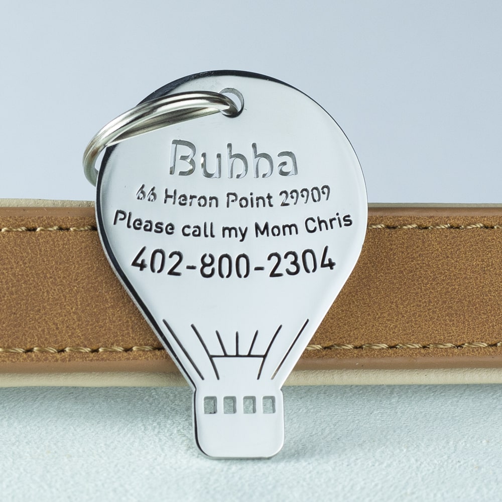 custom hollow laser-cut stainless steel hot air balloon dog ID tag with cut-through name lettering