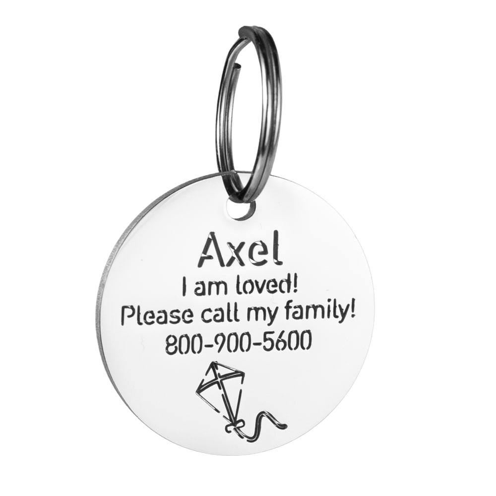 custom hollow laser-cut stainless steel round dog ID tag with kite icon with cut-through name lettering