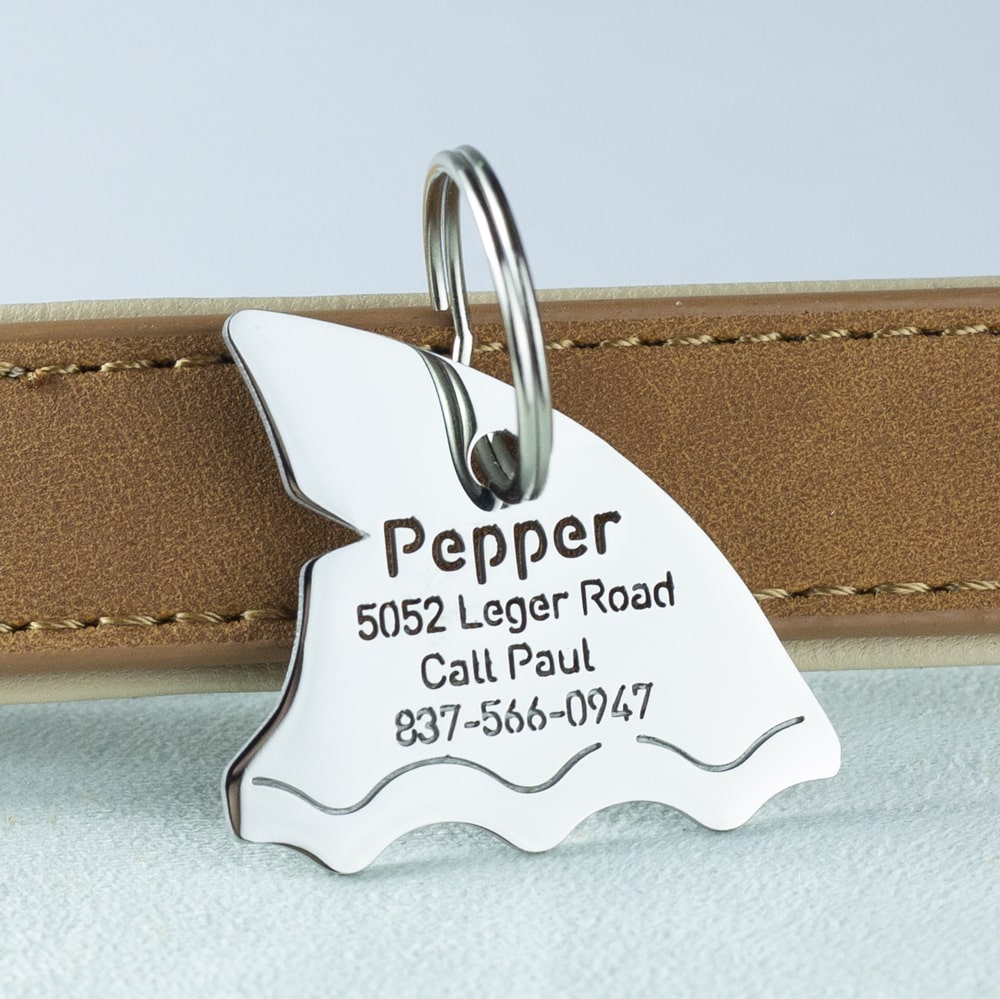 custom hollow laser-cut stainless steel shark dog ID tag with cut-through name lettering