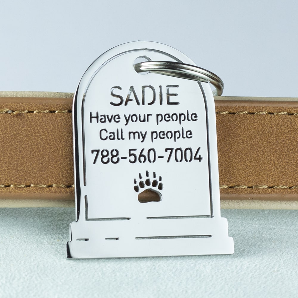 custom hollow laser-cut stainless steel tombstone dog ID tag with cut-through name lettering