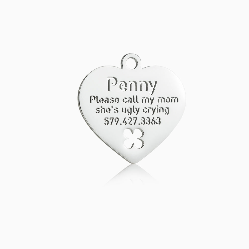custom hollow laser-cut stainless steel heart dog tag with cut-through name lettering