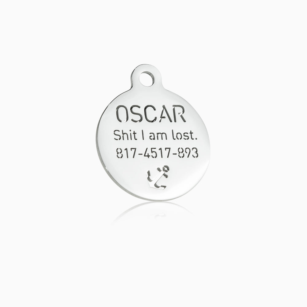 custom hollow laser-cut stainless steel small round dog ID tag with cut-through name lettering