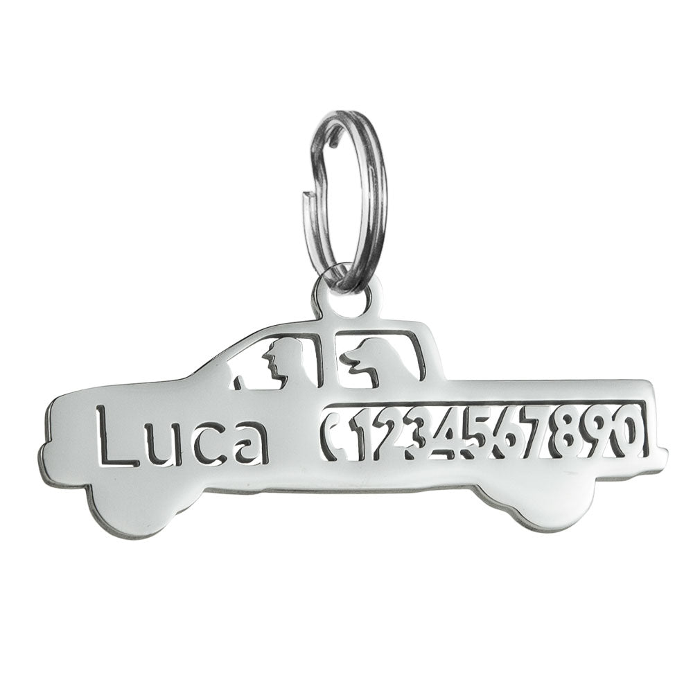 custom hollow laser-cut stainless steel pickup truck dog ID tag with cut-through name lettering